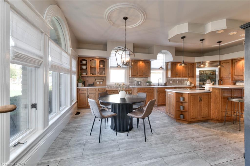 Kitchen and dining space with natural wood cabinets and a warm, inviting design.
